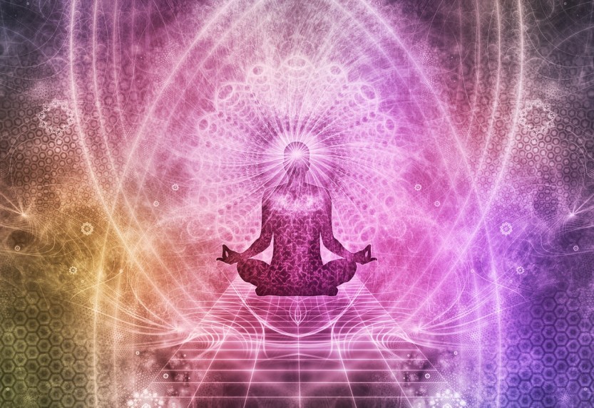 person meditating in a psychedelic vision